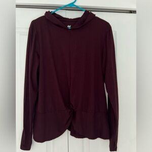 Women’s dip, stretchy top with twist and band at the bottom hem. burgundy XL